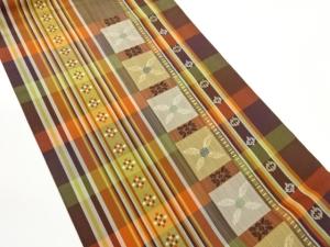 変わり格子に花葉・幾何学模様織出し名古屋帯